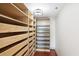 Large walk-in closet with ample shelving and drawers at 2870 Pharr Court South Nw # 2407, Atlanta, GA 30305