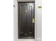 Black front door with gold accents at 2870 Pharr Court South Nw # 2407, Atlanta, GA 30305