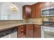Corner kitchen with granite countertops and stainless steel appliances at 2870 Pharr Court South Nw # 2407, Atlanta, GA 30305