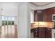 Open concept kitchen with stainless steel appliances and granite countertops at 2870 Pharr Court South Nw # 2407, Atlanta, GA 30305