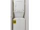 Stackable white washer and dryer in a closet at 2870 Pharr Court South Nw # 2407, Atlanta, GA 30305
