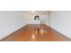 Spacious living room with hardwood floors and kitchen access at 2870 Pharr Court South Nw # 2407, Atlanta, GA 30305