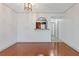 Living room with hardwood floors and open concept kitchen at 2870 Pharr Court South Nw # 2407, Atlanta, GA 30305