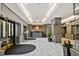 Elegant building lobby with marble floors and chandeliers at 2870 Pharr Court South Nw # 2407, Atlanta, GA 30305