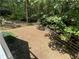 Fenced backyard offering privacy and wooded views at 7655 Abbey Glen Dr, Cumming, GA 30028