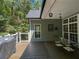 Large deck overlooking wooded area, ideal for outdoor relaxation at 7655 Abbey Glen Dr, Cumming, GA 30028