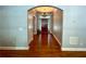 Grand entryway with hardwood floors and a chandelier at 7655 Abbey Glen Dr, Cumming, GA 30028