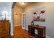 Home office features hardwood floors and built-in desk at 7655 Abbey Glen Dr, Cumming, GA 30028