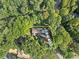 Aerial view showing the property boundary, set on a wooded lot of approximately 0.47 acres at 5775 Lakeshore Dr, Buford, GA 30518