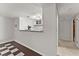 The basement has a kitchenette area with a sink, cabinets, and breakfast bar at 5775 Lakeshore Dr, Buford, GA 30518