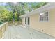 Sunny deck with natural light and double doors perfect for outdoor entertaining and relaxation at 5775 Lakeshore Dr, Buford, GA 30518