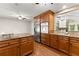 Beautiful kitchen featuring stainless steel appliances, granite countertops, hardwood floors and an eat-in space at 5775 Lakeshore Dr, Buford, GA 30518