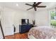 Bright bedroom with hardwood floors, ceiling fan, and ample closet space at 980 Moreland Se Ave, Atlanta, GA 30316