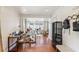Bright entryway with hardwood floors, bench, and home office at 980 Moreland Se Ave, Atlanta, GA 30316