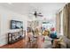 Bright living room with hardwood floors, comfortable seating, and large TV at 980 Moreland Se Ave, Atlanta, GA 30316