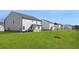Large backyard with multiple houses and green grass at 608 Kimberwick Dr, Locust Grove, GA 30248