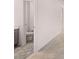 Small half bathroom with toilet and vanity at 608 Kimberwick Dr, Locust Grove, GA 30248