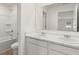 Clean bathroom with double vanity and bathtub at 608 Kimberwick Dr, Locust Grove, GA 30248