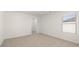 Spacious bedroom with window and access to closet at 608 Kimberwick Dr, Locust Grove, GA 30248