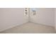 Bright bedroom with carpeted floor and windows at 608 Kimberwick Dr, Locust Grove, GA 30248