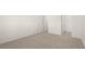 Spacious bedroom with carpeted floor and ample closet space at 608 Kimberwick Dr, Locust Grove, GA 30248
