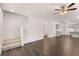 Spacious living room with hardwood floors and staircase at 608 Kimberwick Dr, Locust Grove, GA 30248