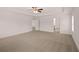 Main bedroom with carpet and access to bathroom at 608 Kimberwick Dr, Locust Grove, GA 30248