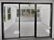 Sunroom with many windows providing natural light and outdoor views at 7131 Forest Ln, Union City, GA 30291