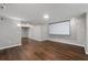 Finished basement featuring recessed lighting, sleek floors, and a projector screen at 905 Freedom Ln, Roswell, GA 30075