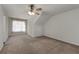 Bedroom featuring carpeted floors, a ceiling fan and natural light at 905 Freedom Ln, Roswell, GA 30075