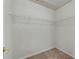 Walk-in closet with shelving for ample storage at 905 Freedom Ln, Roswell, GA 30075