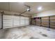 Two car garage with shelving units installed at 905 Freedom Ln, Roswell, GA 30075