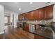 Well-equipped kitchen featuring stainless steel appliances and plenty of counter space at 905 Freedom Ln, Roswell, GA 30075
