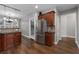 Spacious kitchen features stainless steel appliances, granite countertops and ample storage at 905 Freedom Ln, Roswell, GA 30075