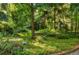 Serene backyard retreat with a bench and lantern at 5635 Lake Forrest Dr, Atlanta, GA 30342