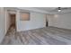 Open basement space with gray floors, neutral walls, and access to other rooms in the home at 2921 Wickford Nw Dr, Kennesaw, GA 30152
