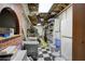Unfinished basement with storage shelves, utilities, and exposed ceiling, ready to be transformed at 2921 Wickford Nw Dr, Kennesaw, GA 30152