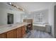 Vanity and sunken tub in a bright and airy bathroom space at 2921 Wickford Nw Dr, Kennesaw, GA 30152