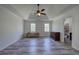 Spacious bedroom features a tray ceiling and ample natural light at 2921 Wickford Nw Dr, Kennesaw, GA 30152