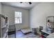 Utility room equipped with storage solutions, a dog bed and a window view at 2921 Wickford Nw Dr, Kennesaw, GA 30152