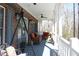 Relaxing covered back porch with comfortable seating, perfect for outdoor enjoyment at 2100 Indian Shoals Dr, Loganville, GA 30052