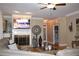 Inviting living room featuring a fireplace with TV, and doorway through to another room at 2100 Indian Shoals Dr, Loganville, GA 30052