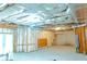 Unfinished basement with insulated walls, concrete floors, exposed ductwork, and access to the outdoors at 4850 Guilford Forest Sw Dr, Atlanta, GA 30331