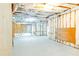 Unfinished basement featuring insulated walls and ceiling, concrete floors, and exposed ductwork, ready for customization at 4850 Guilford Forest Sw Dr, Atlanta, GA 30331