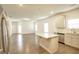 Open-concept kitchen with an island, stainless steel appliances, and lots of natural light at 3201 Camden Ct, Atlanta, GA 30349