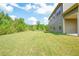 Spacious backyard with lush green lawn, perfect for outdoor activities at 3201 Camden Ct, Atlanta, GA 30349