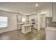 Bright kitchen with stainless steel appliances, granite countertops, and a convenient center island at 3201 Camden Ct, Atlanta, GA 30349