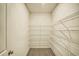 Walk-in closet featuring an organized shelving system, maximizing storage in a compact space at 3201 Camden Ct, Atlanta, GA 30349