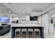 Basement bar area with quartz countertop and bar stools at 8540 Prairie Dunes Way, Duluth, GA 30097