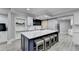 Modern basement kitchen with large island and bar seating at 8540 Prairie Dunes Way, Duluth, GA 30097